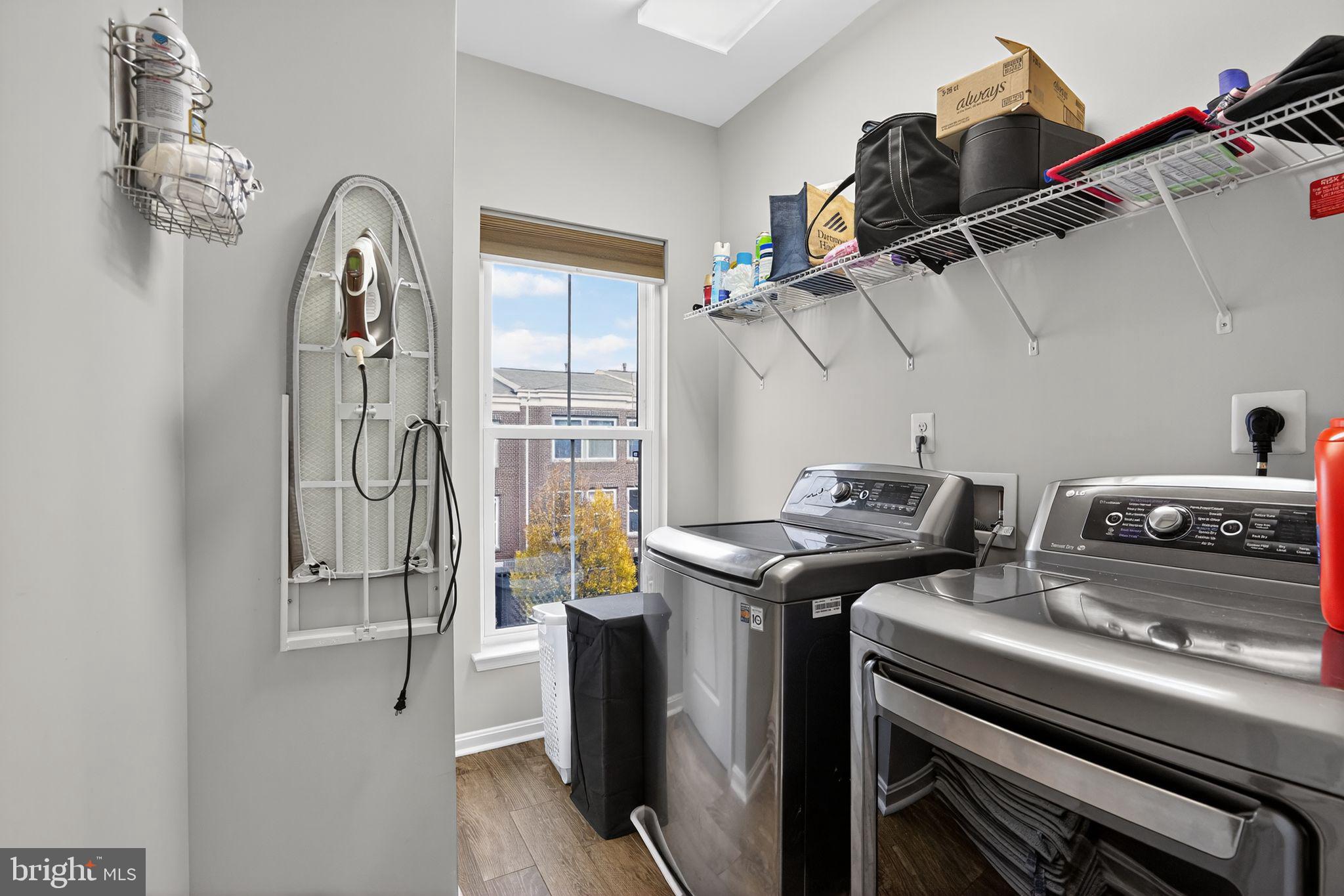 42239 Riggins Ridge Terrace Brambleton, VA 20148 - Photo 23 of 30 a utility room with dryer and washer