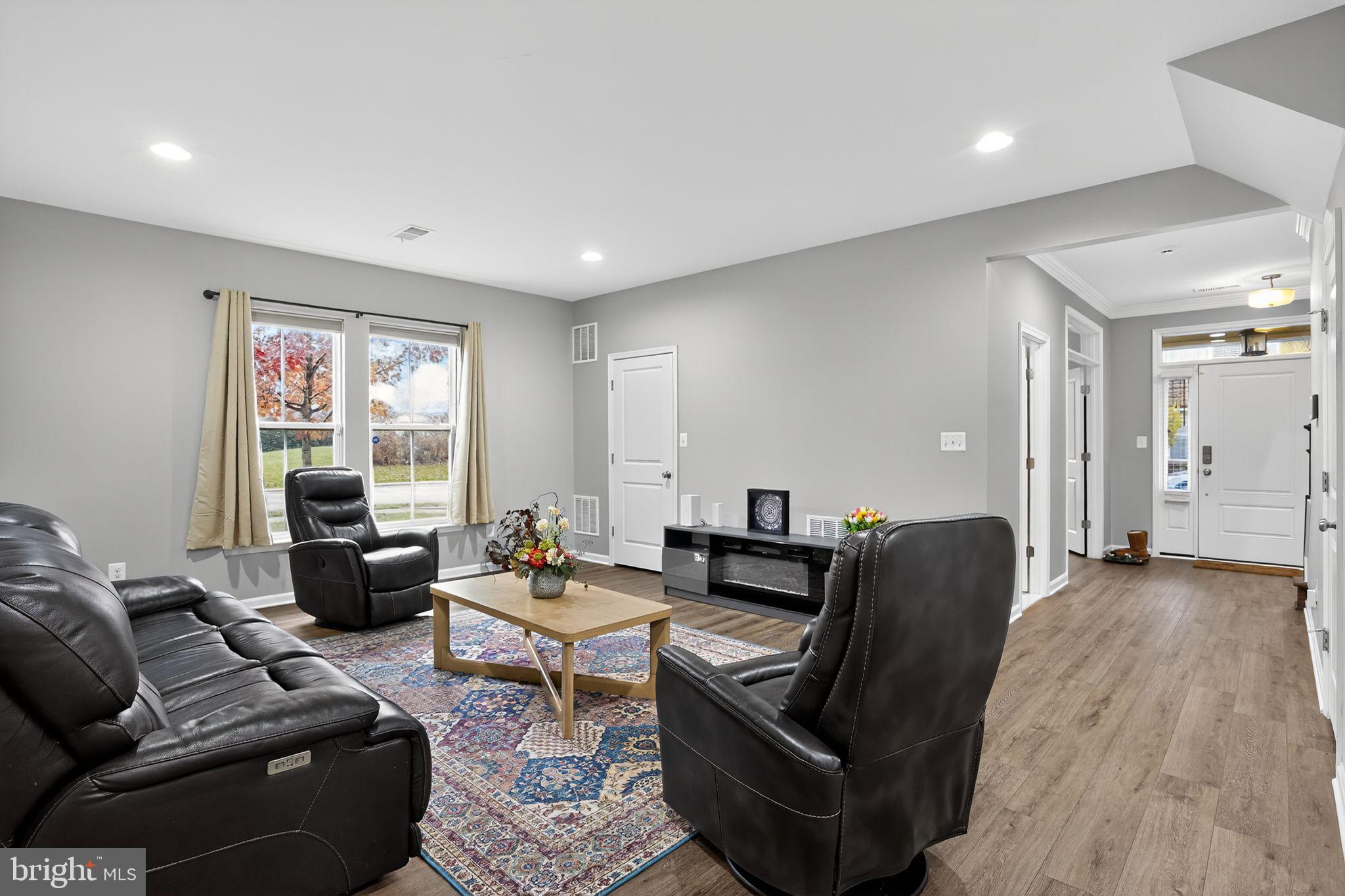 42239 Riggins Ridge Terrace Brambleton, VA 20148 - Photo 26 of 30 a living room with furniture and a window