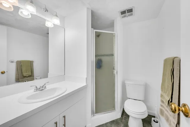 a view of livingroom with furniture and windows