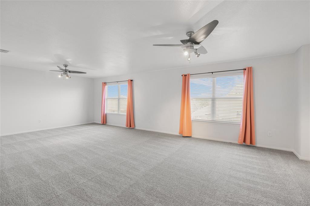 1514 Hanover Lane Van Alstyne, TX 75495 - Photo 28 of 39 a view of an empty room with a window