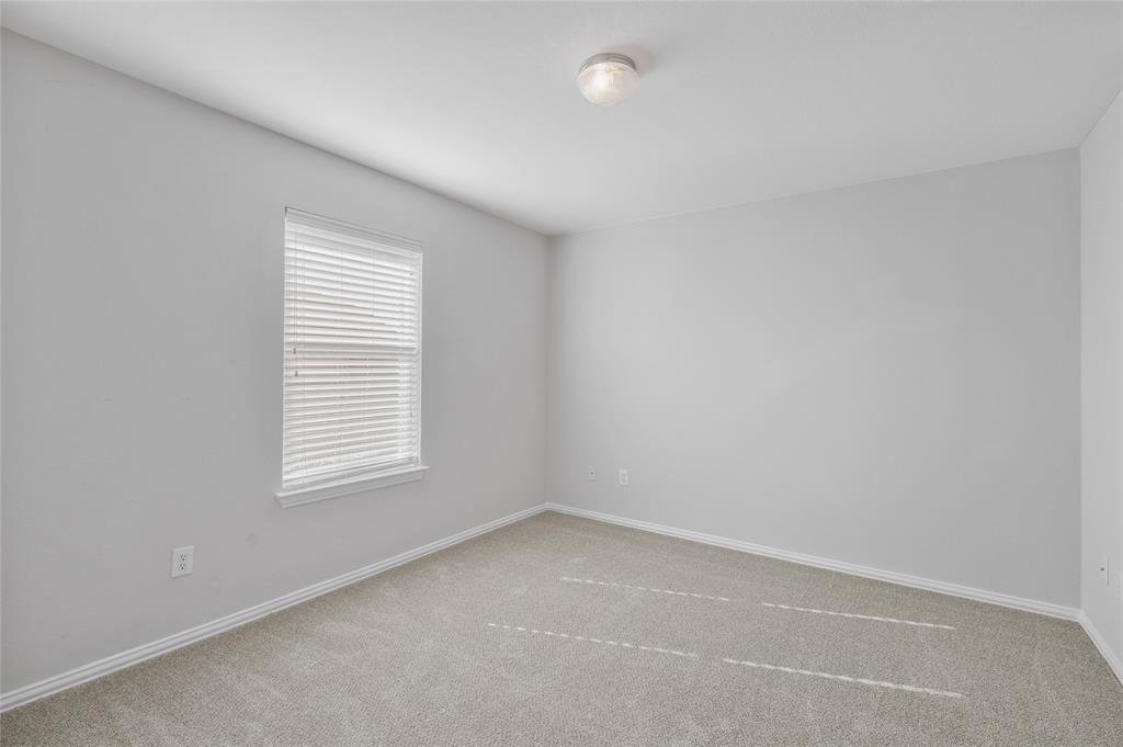 1514 Hanover Lane Van Alstyne, TX 75495 - Photo 35 of 39 an empty room with a window