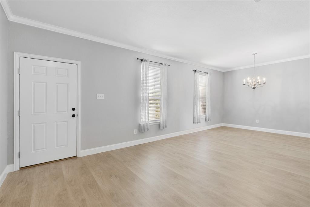 1514 Hanover Lane Van Alstyne, TX 75495 - Photo 9 of 39 a view of an empty room with a window