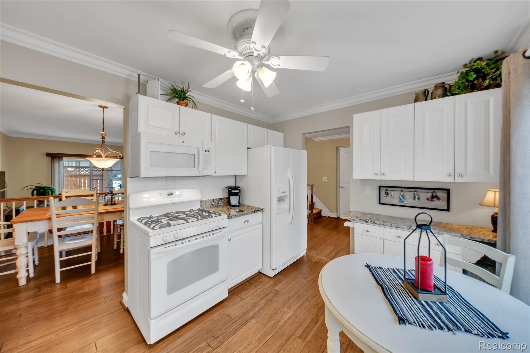 1417 Paddle Wheel Lane, Unit 38 Rochester, MI 48306 - Photo 5 of 29 Updated kitchen opens into the dining area.