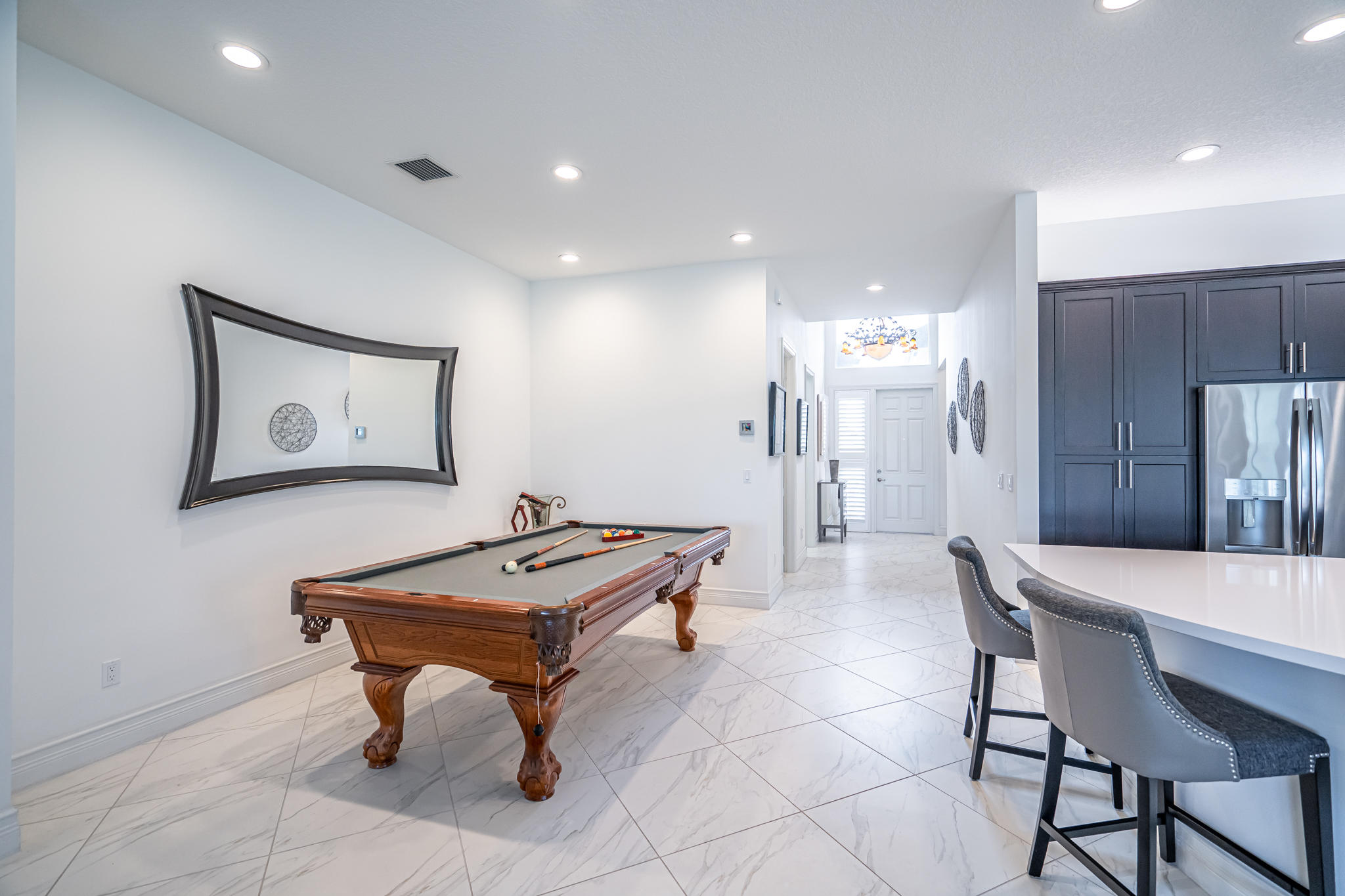 12591 Bonnington Range Drive Boynton Beach, FL 33473 - Photo 12 of 62 a room with furniture a table and chairs