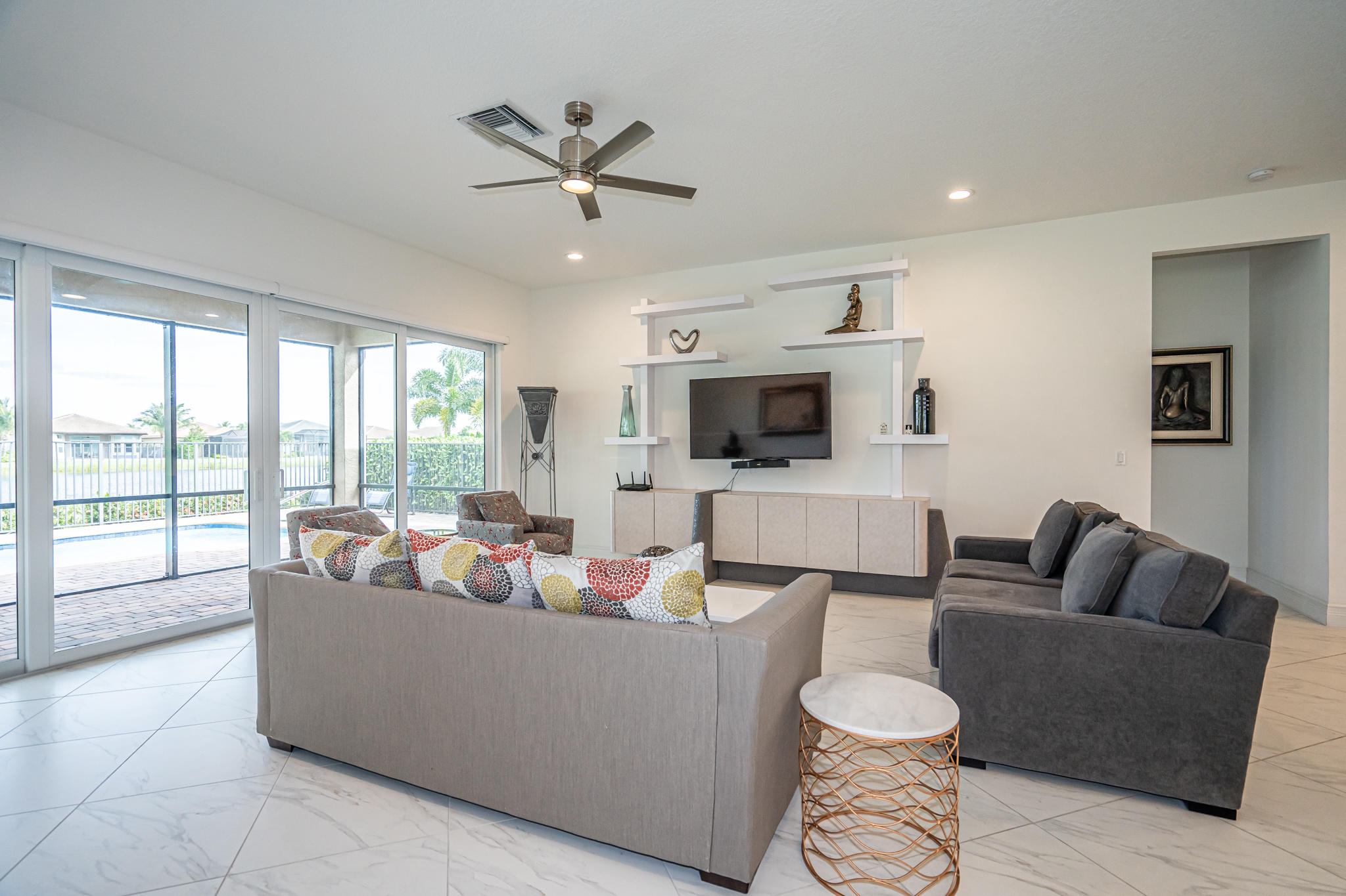 12591 Bonnington Range Drive Boynton Beach, FL 33473 - Photo 14 of 62 a living room with furniture and a flat screen tv