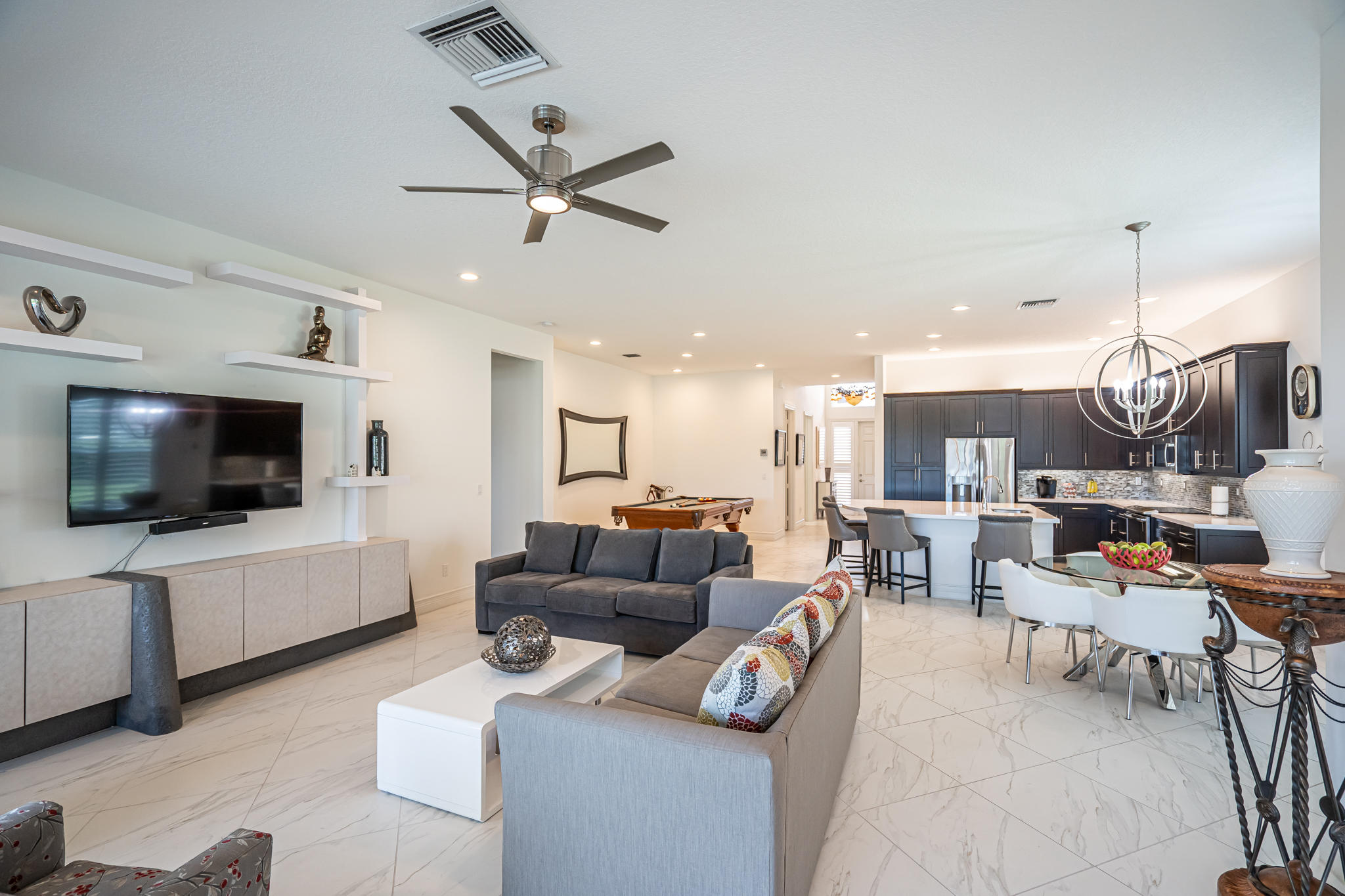 12591 Bonnington Range Drive Boynton Beach, FL 33473 - Photo 15 of 62 a living room with furniture and a flat screen tv