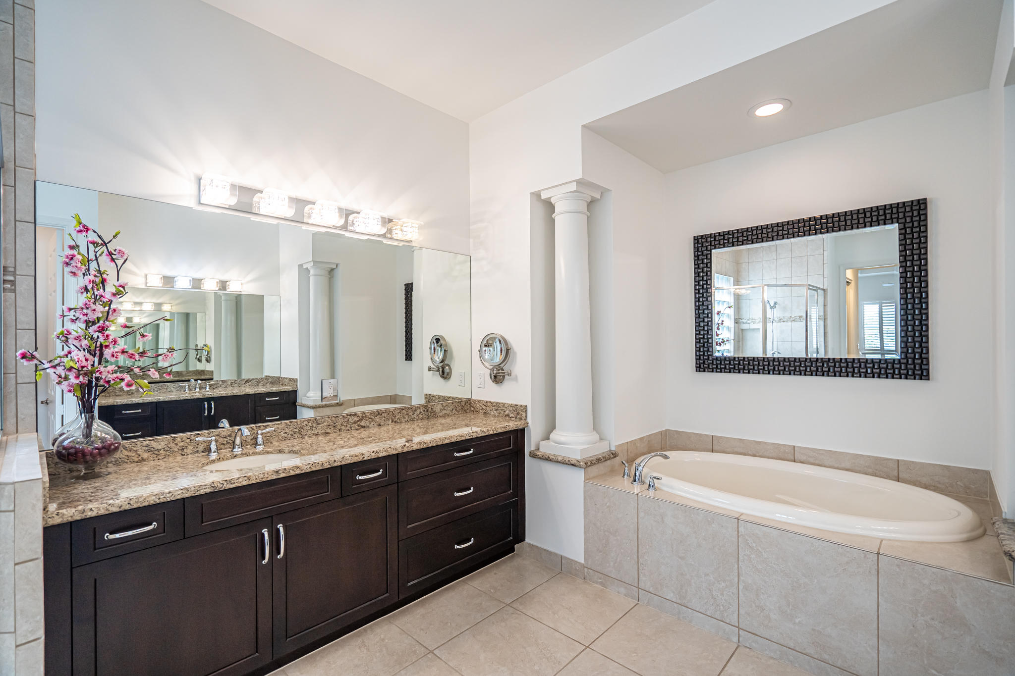 12591 Bonnington Range Drive Boynton Beach, FL 33473 - Photo 20 of 62 a spacious bathroom with a granite countertop tub sink and mirror