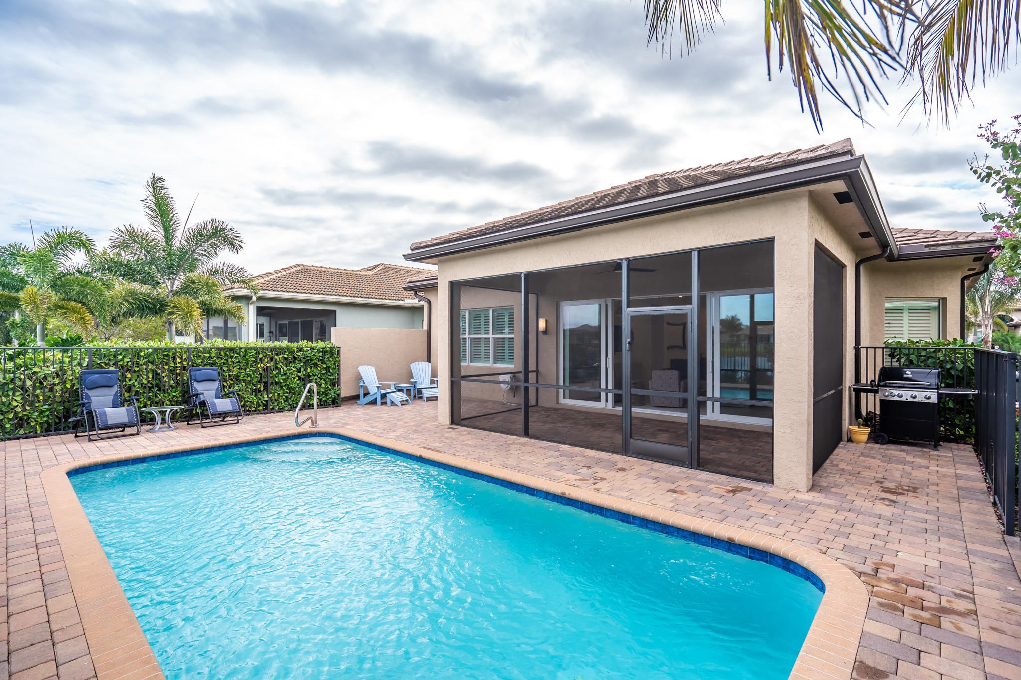 12591 Bonnington Range Drive Boynton Beach, FL 33473 - Photo 33 of 62 a view of house with backyard outdoor seating and trampoline