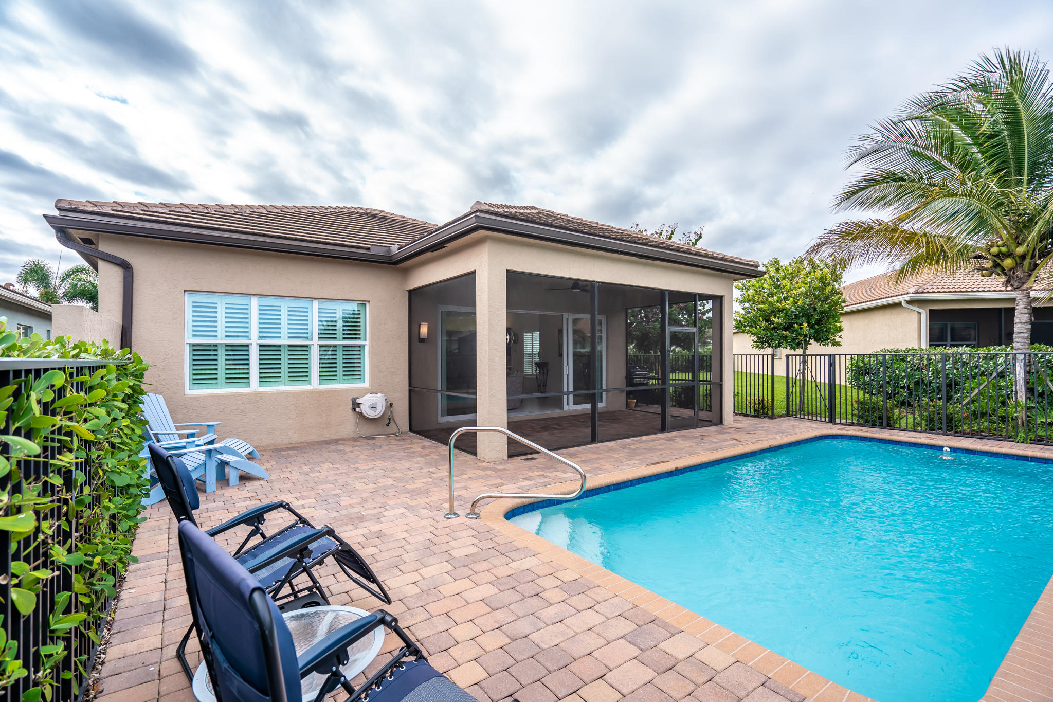 12591 Bonnington Range Drive Boynton Beach, FL 33473 - Photo 34 of 62 a view of a house with pool and sitting area
