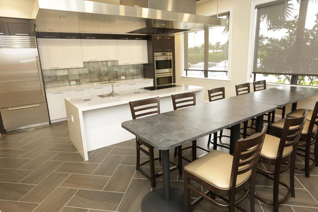 12591 Bonnington Range Drive Boynton Beach, FL 33473 - Photo 52 of 62 a view of a dining room with furniture window and outside view