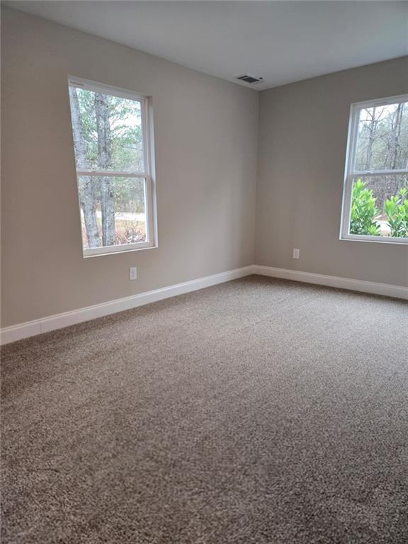 2197 Holders Siding Road Jefferson, GA 30549 - Photo 18 of 29 an empty room with windows