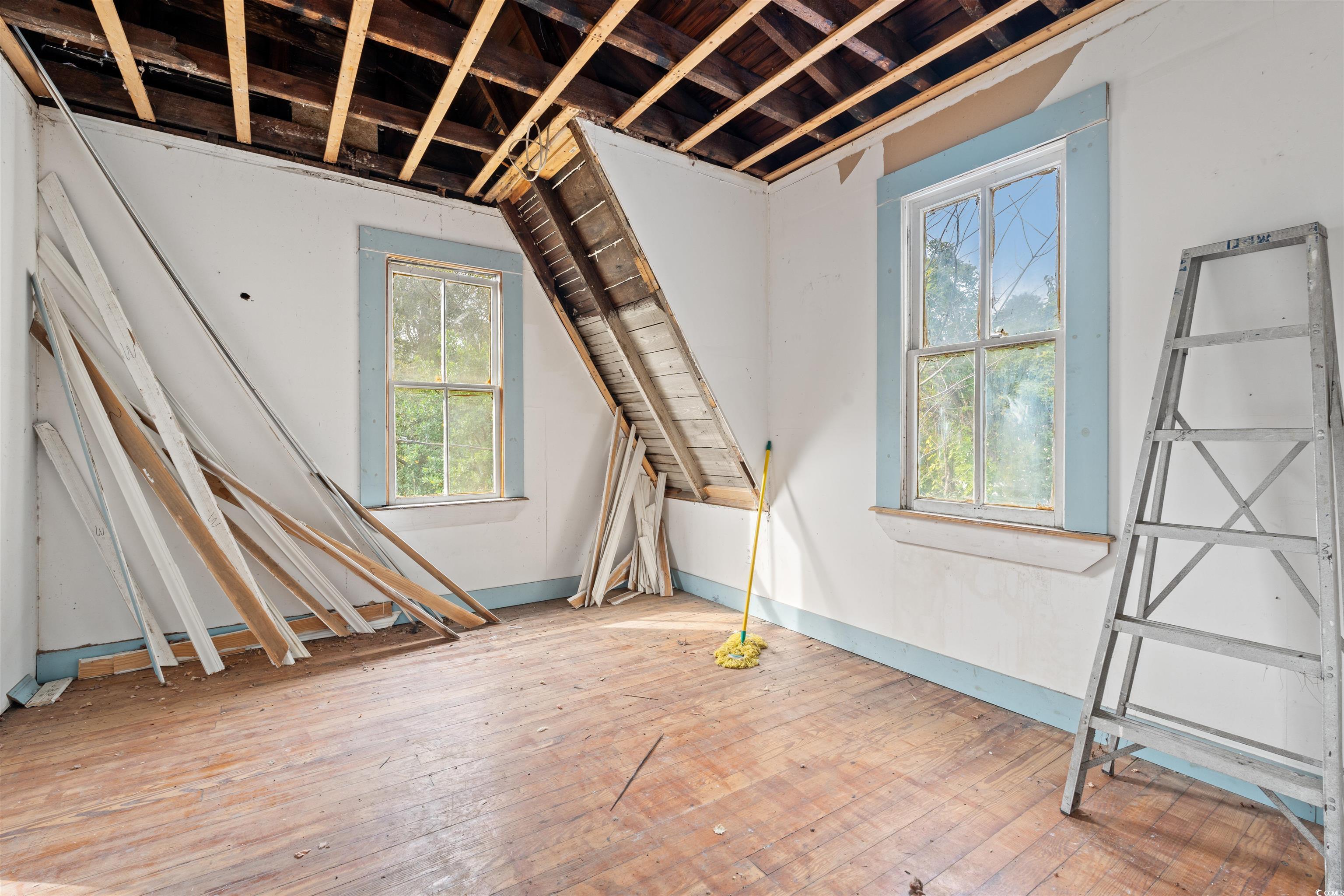 133 Wood Street Georgetown, SC 29440 - Photo 12 of 37 Miscellaneous room with wood-type flooring and baseboards