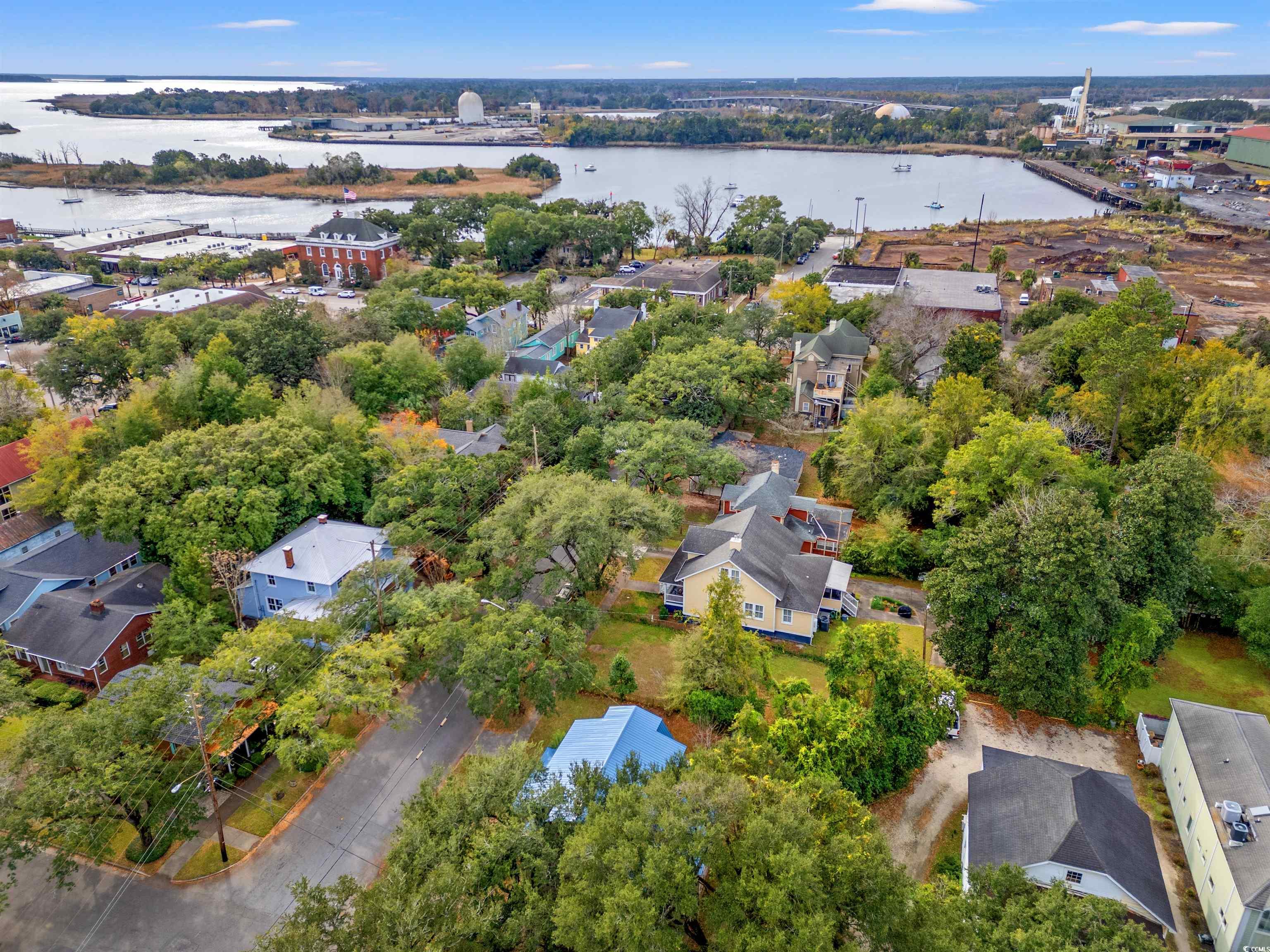 133 Wood Street Georgetown, SC 29440 - Photo 23 of 37 Aerial view of residential area with a nearby body of water