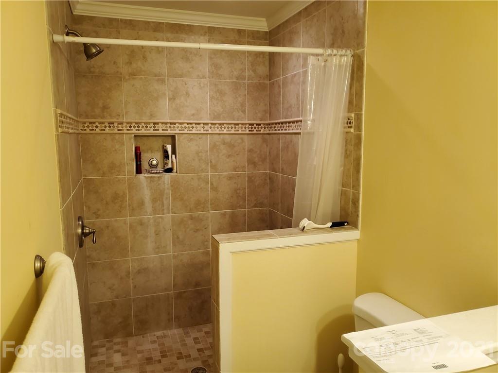 1155 Barnhardt Road China Grove, NC 28023 - Photo 7 of 12 a bathroom with a sink toilet and shower