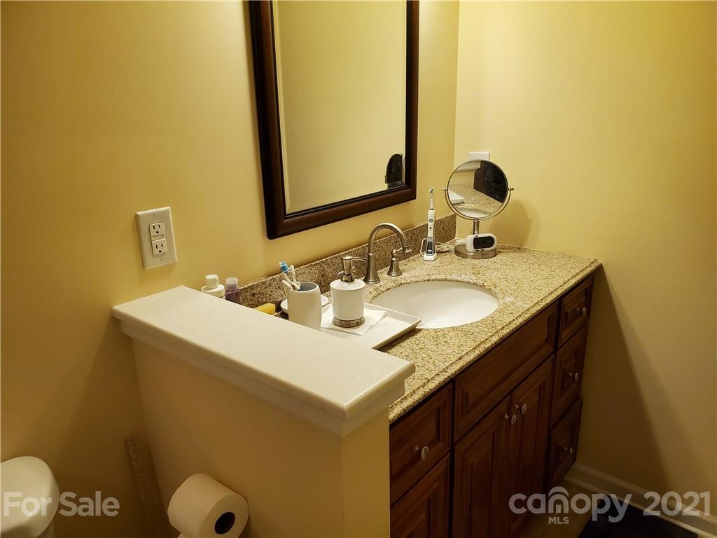 1155 Barnhardt Road China Grove, NC 28023 - Photo 8 of 12 a bathroom with a sink and a mirror
