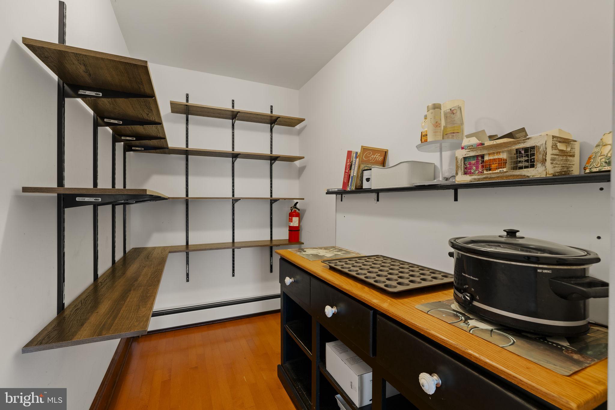 451 Pine Swamp Road Elverson, PA 19520 - Photo 13 of 91 a kitchen with stainless steel appliances granite countertop a stove and a microwave