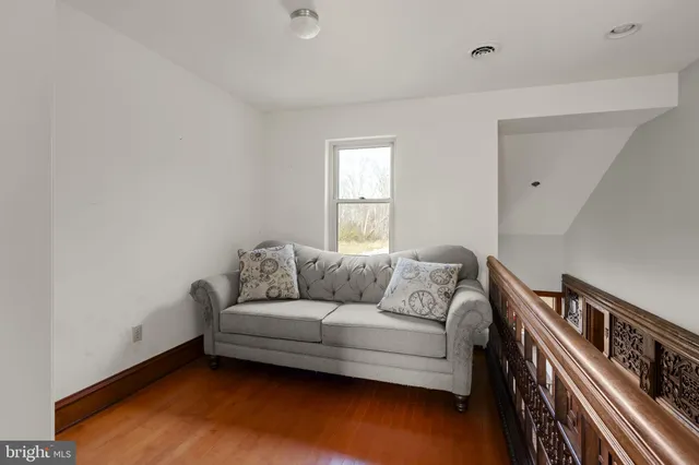 a view of a room that has a window in it