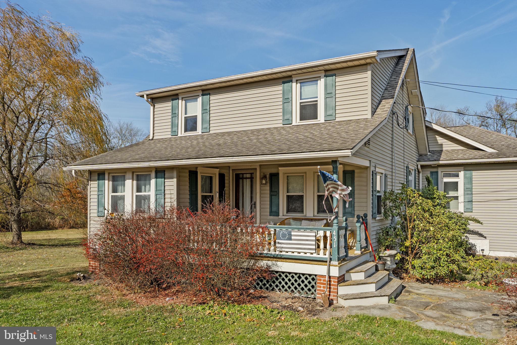 451 Pine Swamp Road Elverson, PA 19520 - Photo 2 of 91 front view of a house with a yard