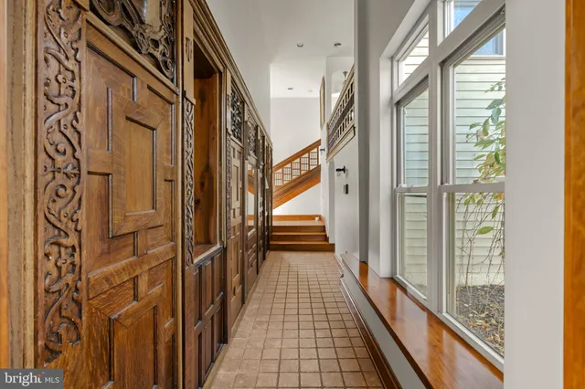 a bathroom with a tub and a sink