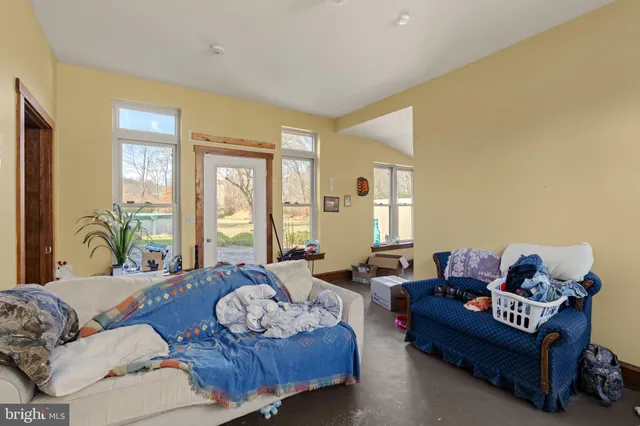a stove top oven sitting inside of a kitchen