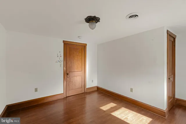 a house with trees in front of it