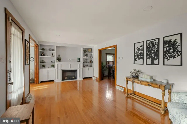 a view of a dining room with furniture and window