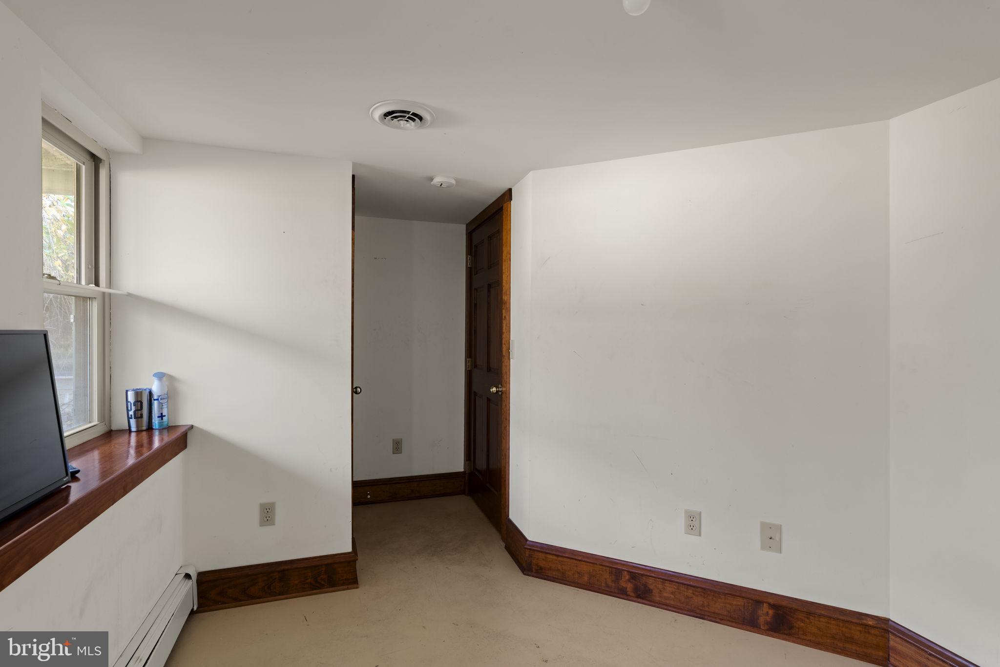 451 Pine Swamp Road Elverson, PA 19520 - Photo 42 of 91 a view of a room with an empty space