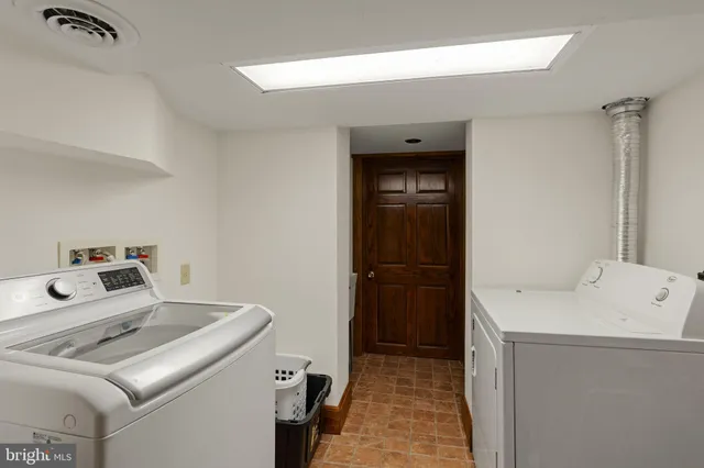 a view of a swimming pool with lounge chair