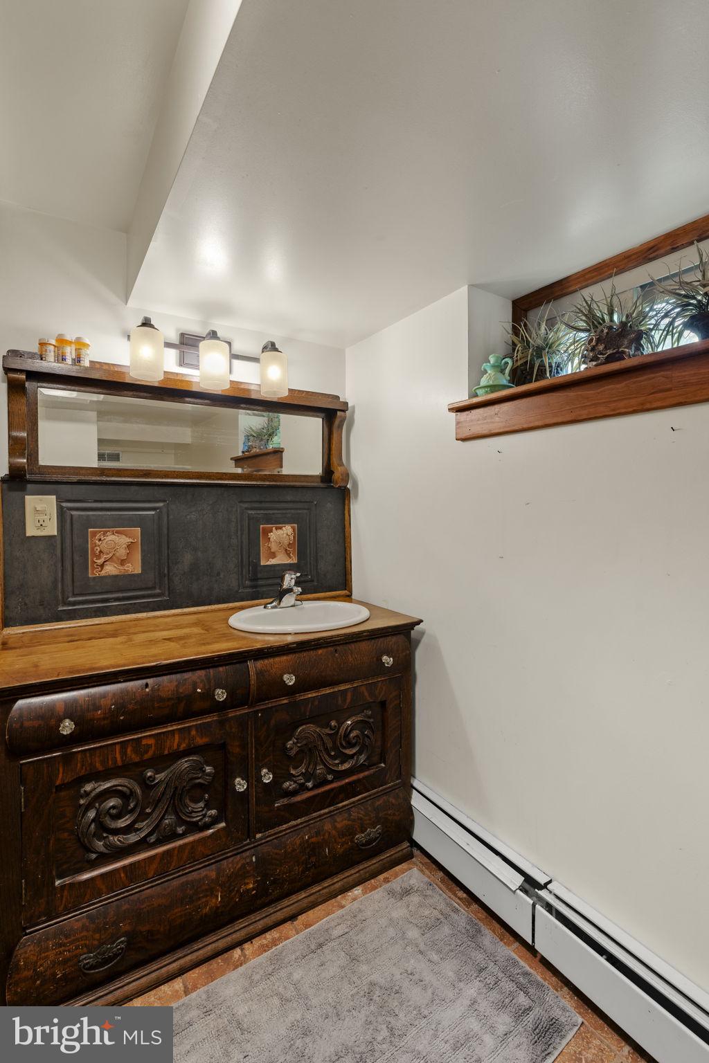 451 Pine Swamp Road Elverson, PA 19520 - Photo 48 of 91 a stove top oven sitting inside of a kitchen