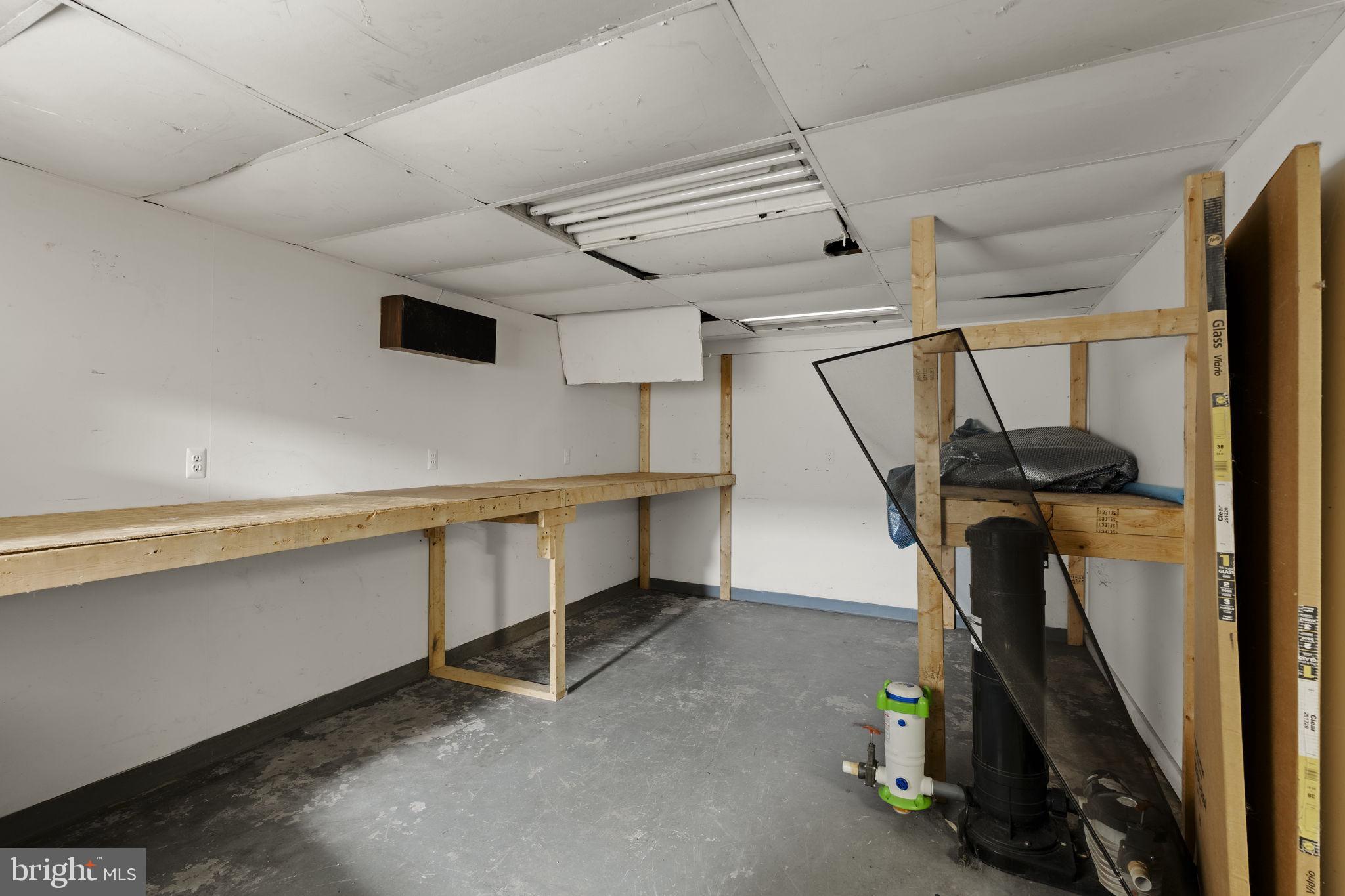 451 Pine Swamp Road Elverson, PA 19520 - Photo 56 of 91 a view of a room with gym equipment