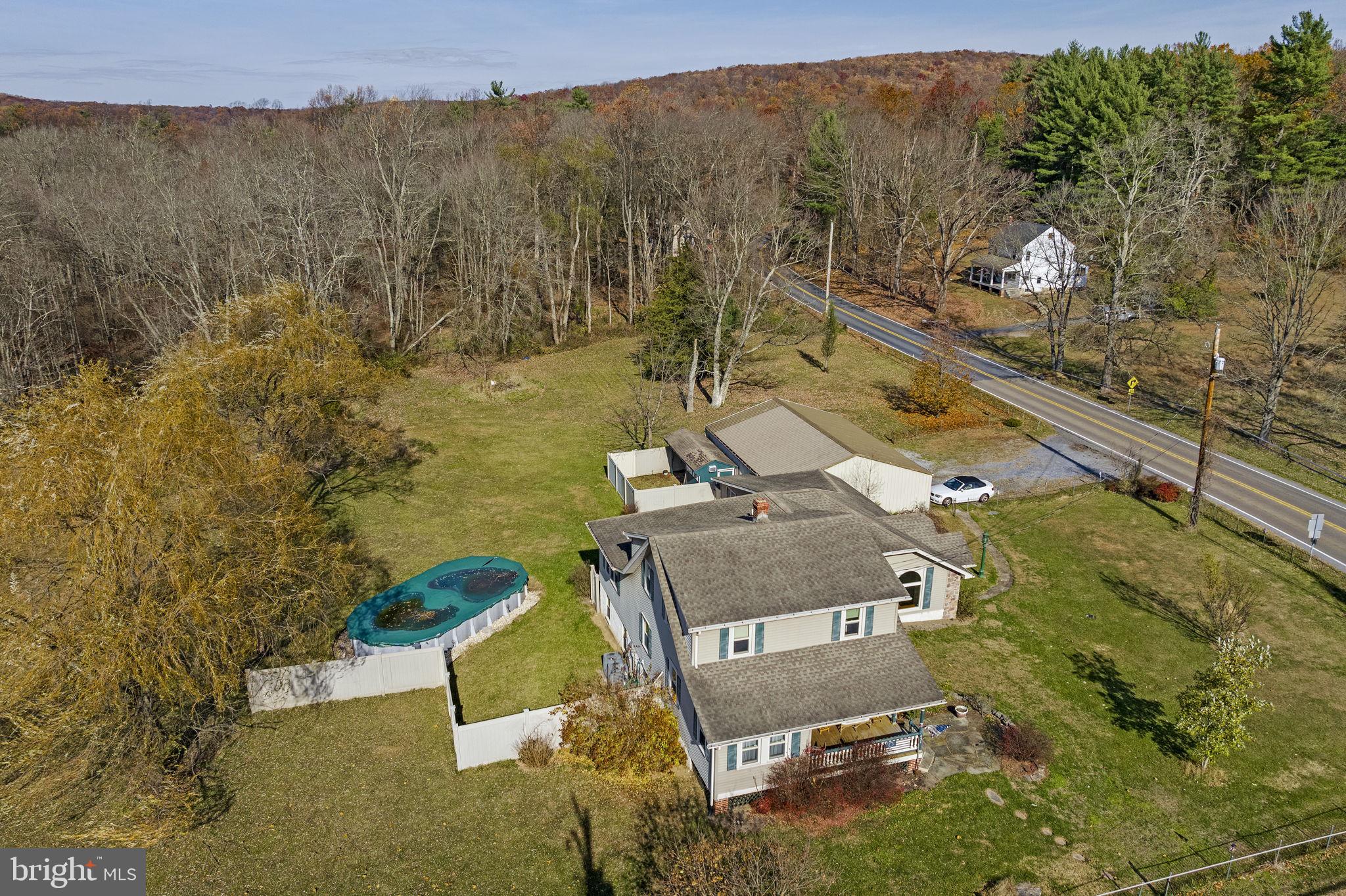 451 Pine Swamp Road Elverson, PA 19520 - Photo 66 of 91 an aerial view of residential house with outdoor space