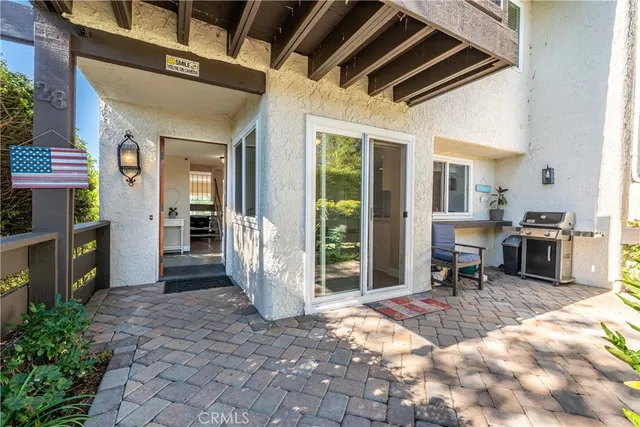 a view of a hallway with seating area