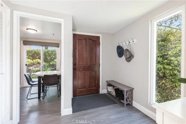 a view of workspace with furniture and window