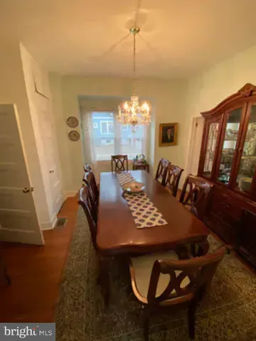 a view of a dining room with furniture