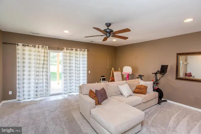 a bed room with a bed and a chandelier