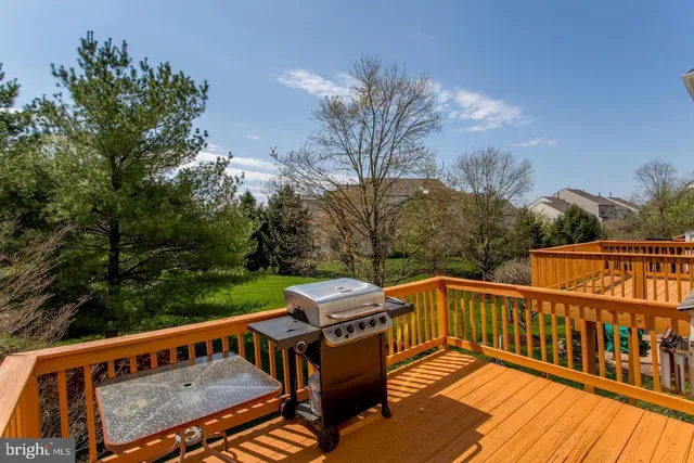 a view of a roof deck with couches