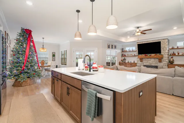 a kitchen with a sink and a stove