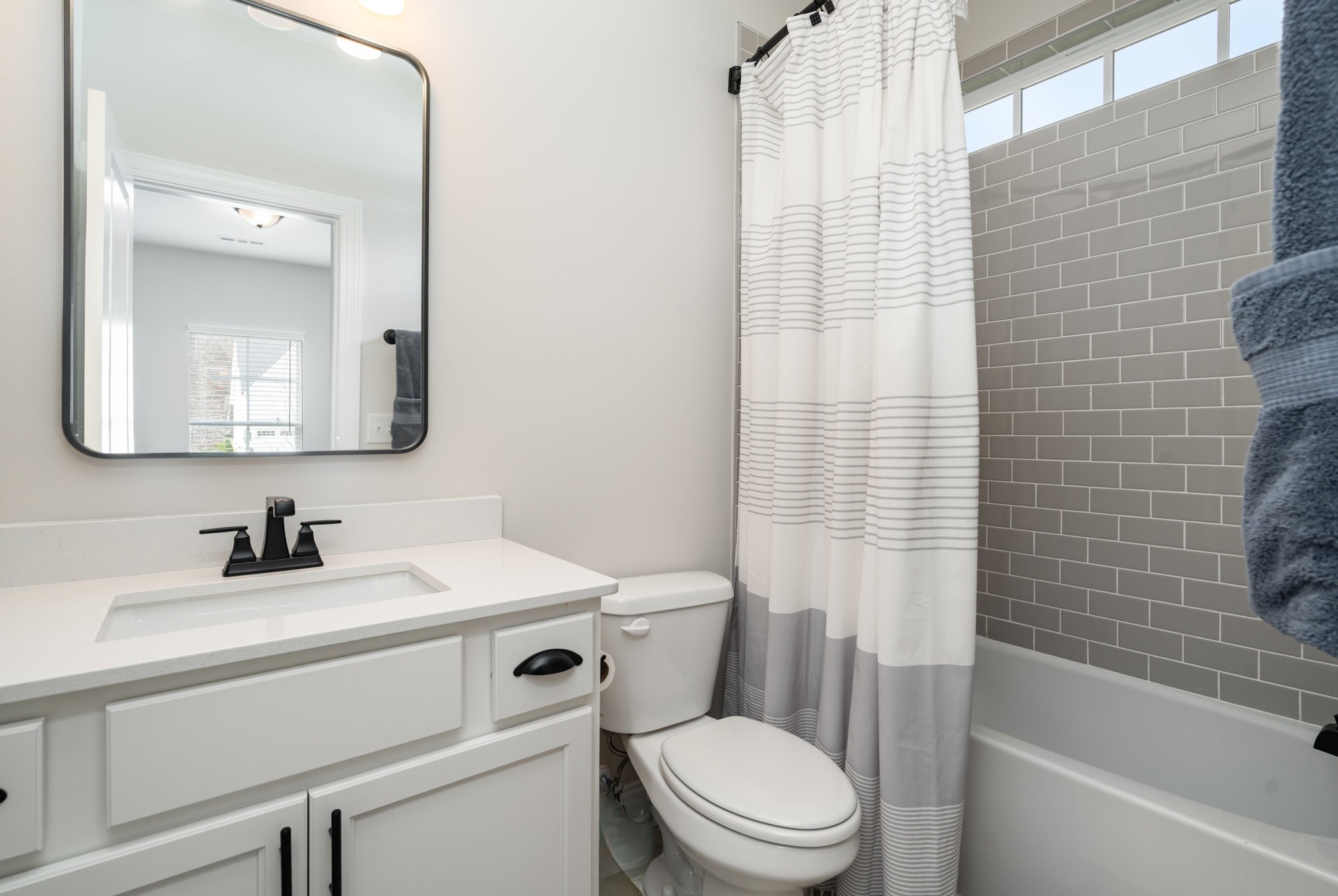 7445 Swindon Boulevard Fairview, TN 37062 - Photo 23 of 38 a bathroom with a toilet a sink and a bathtub