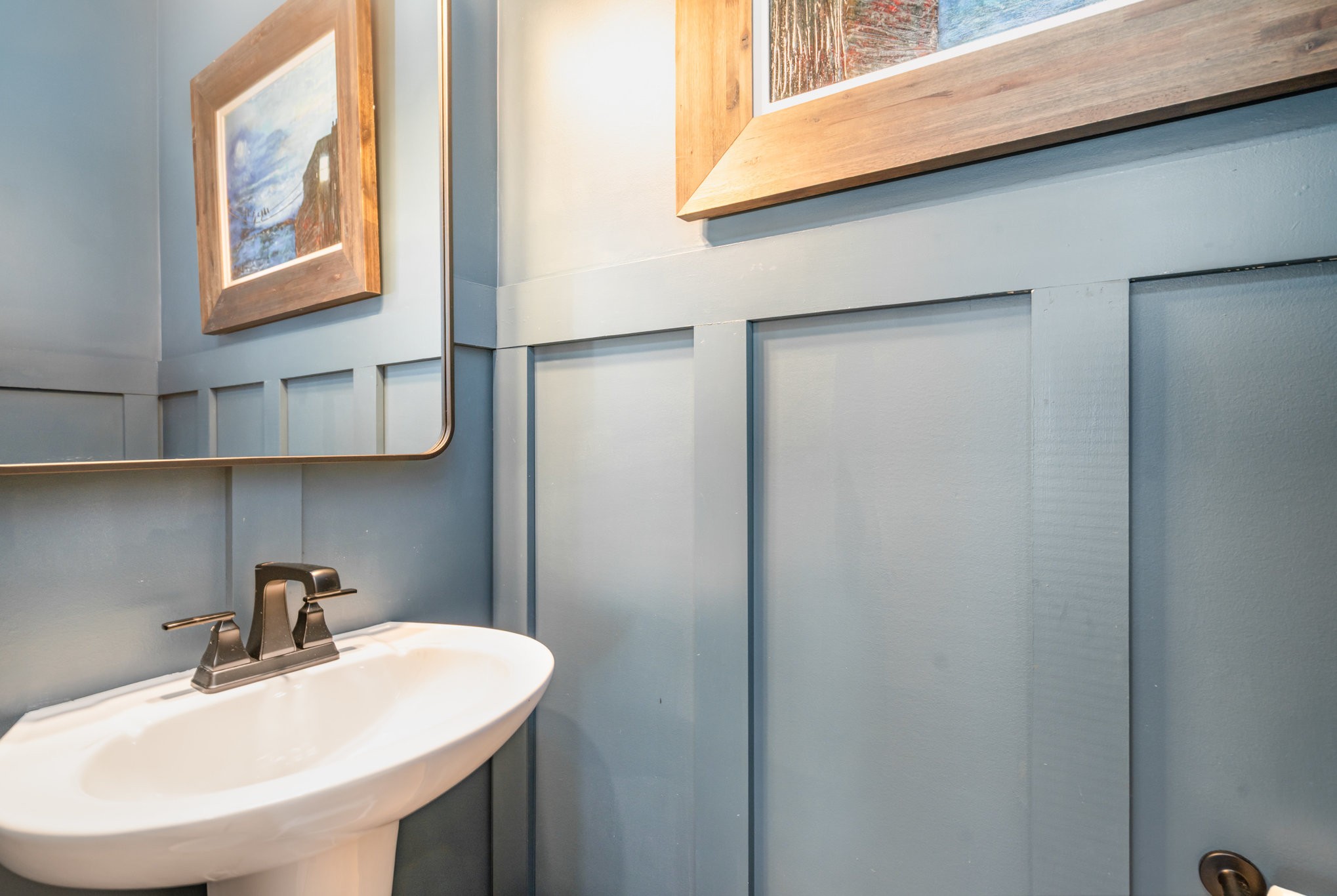 7445 Swindon Boulevard Fairview, TN 37062 - Photo 24 of 38 a bathroom with a sink and a mirror