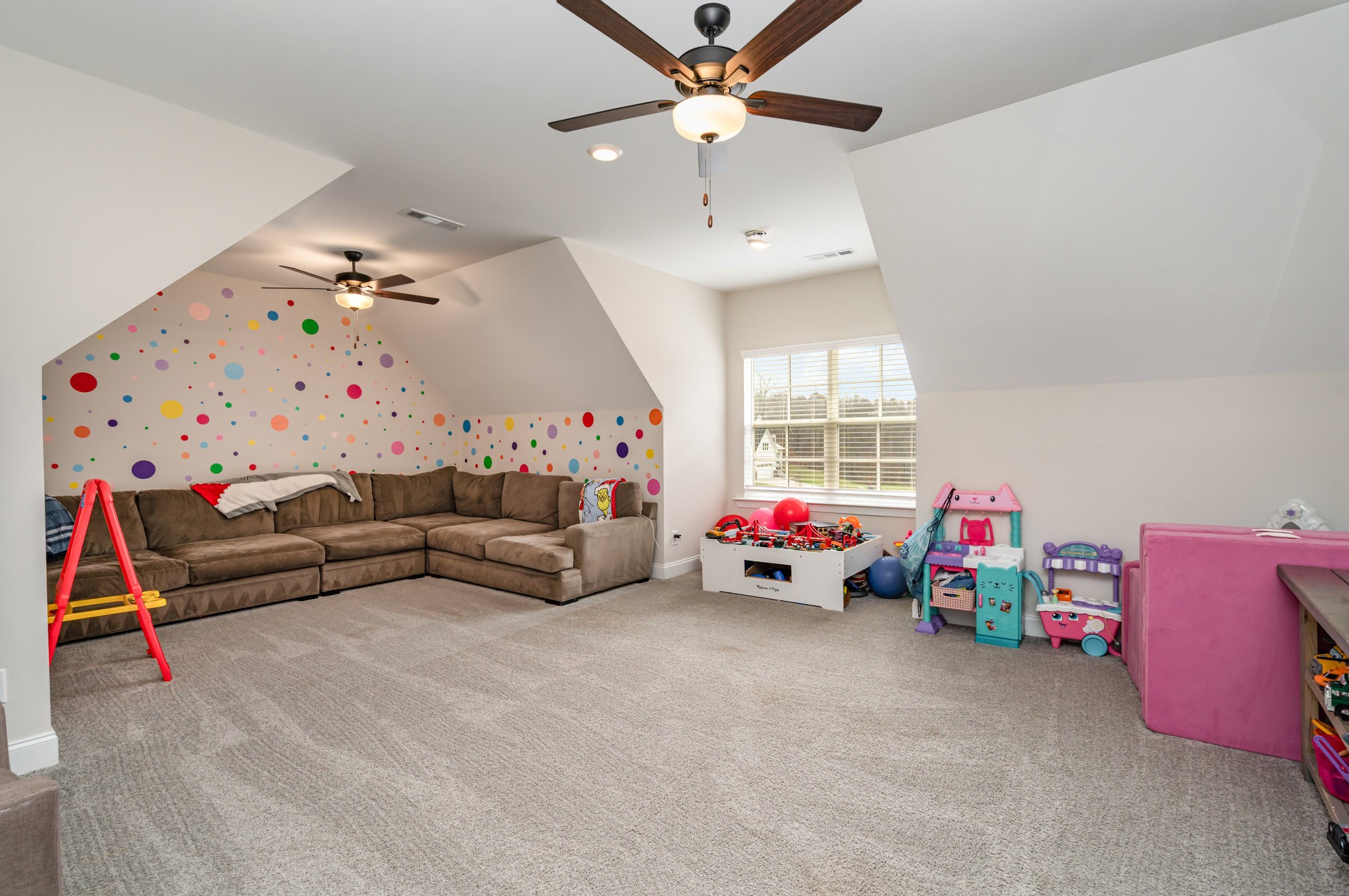 7445 Swindon Boulevard Fairview, TN 37062 - Photo 26 of 38 a living room with furniture and a large window
