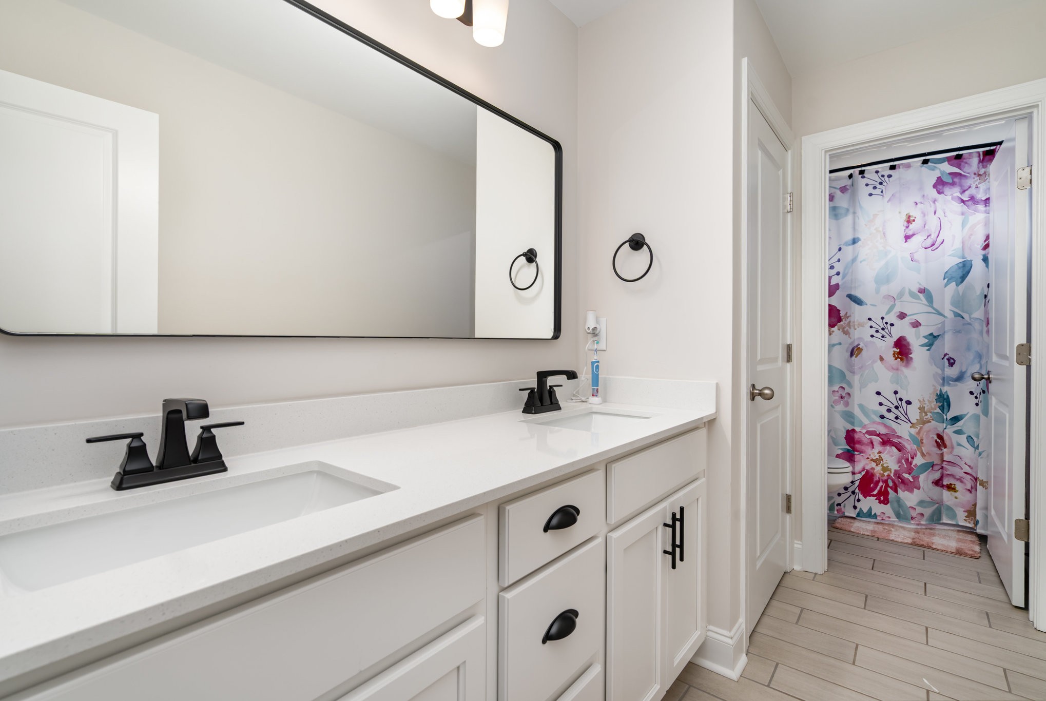 7445 Swindon Boulevard Fairview, TN 37062 - Photo 28 of 38 a view of a sink and a mirror