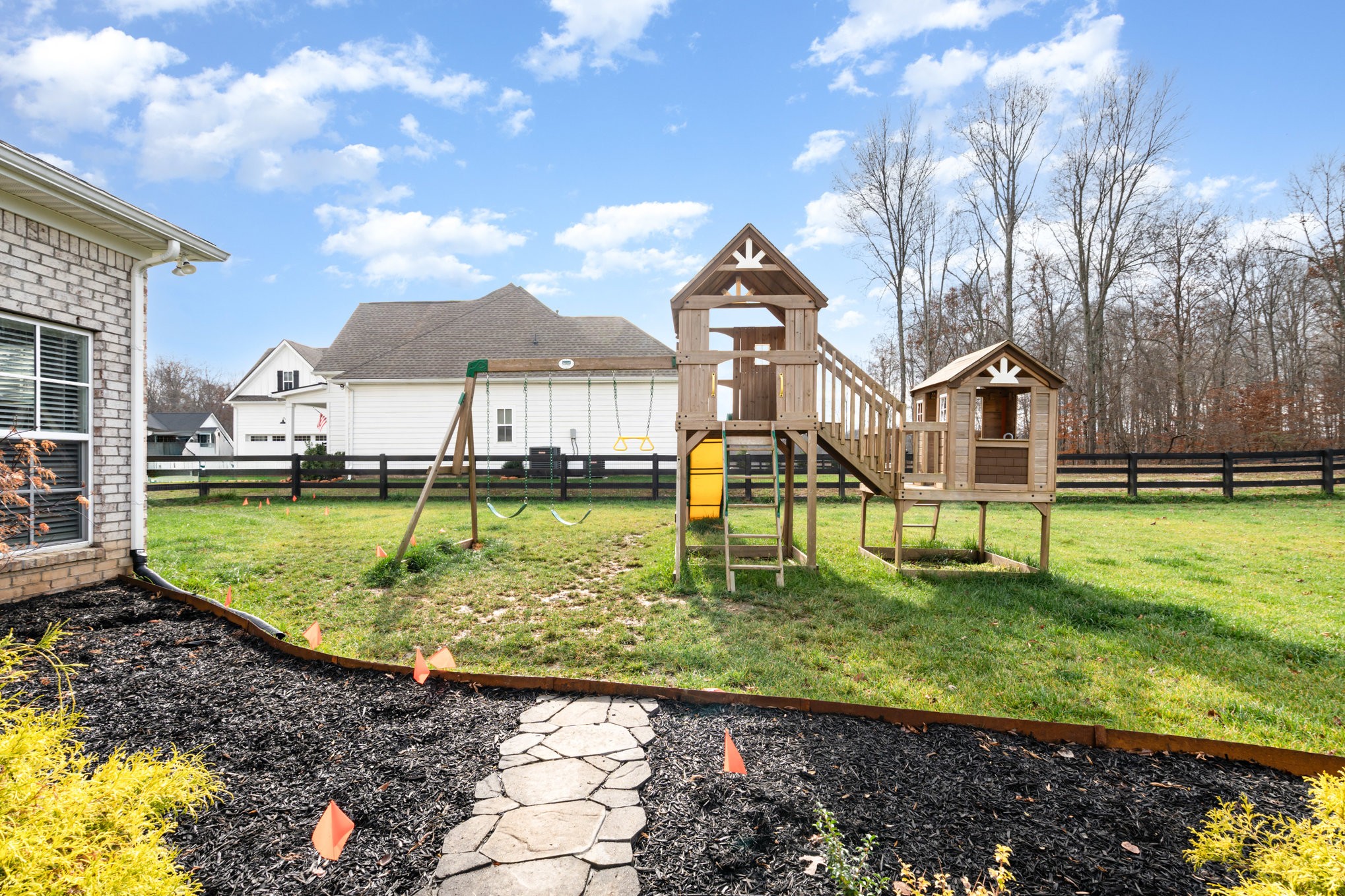 7445 Swindon Boulevard Fairview, TN 37062 - Photo 34 of 38 a front view of a house with a yard