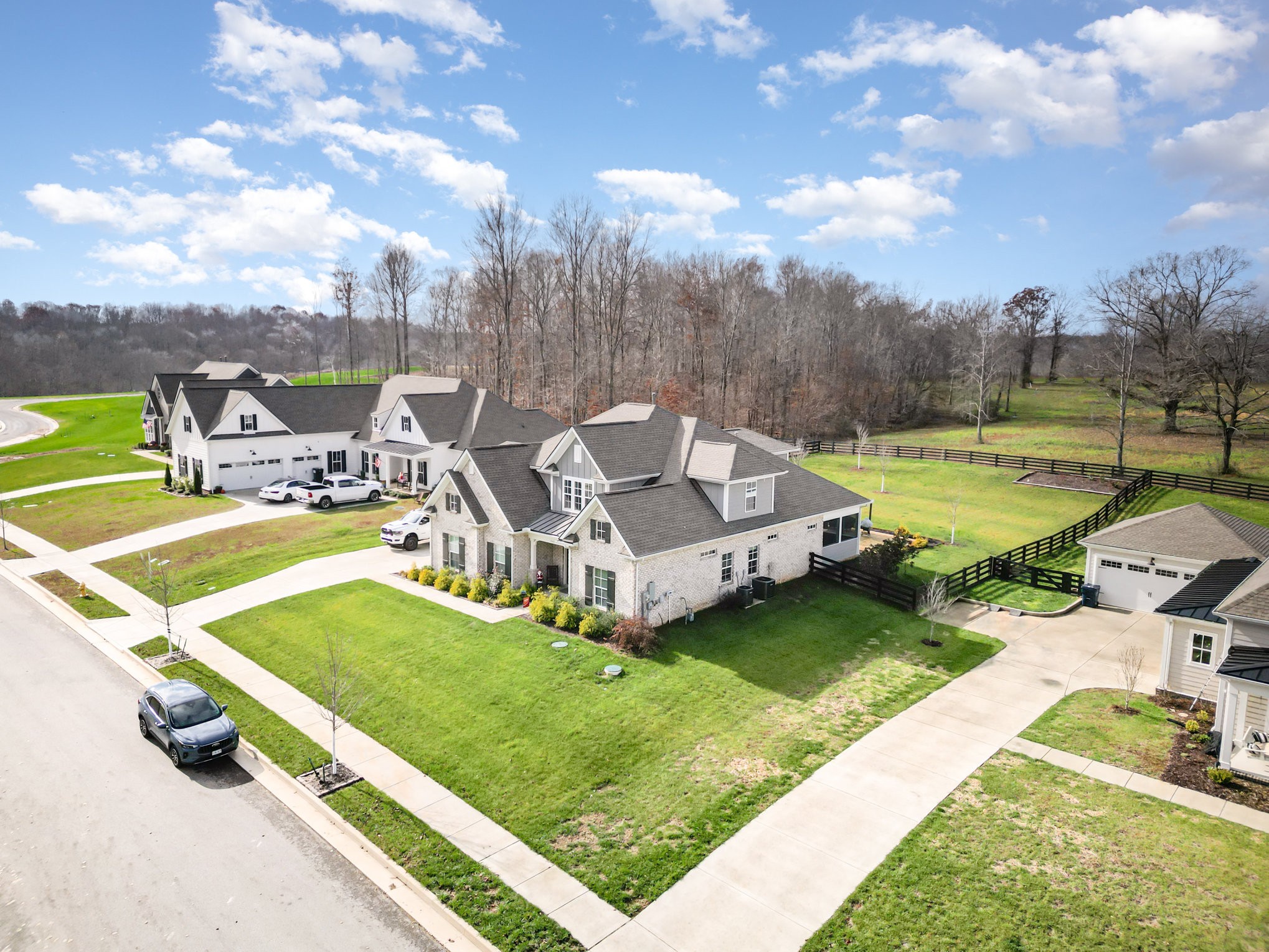 7445 Swindon Boulevard Fairview, TN 37062 - Photo 36 of 38 a view of a swimming pool with lawn chairs and a big yard