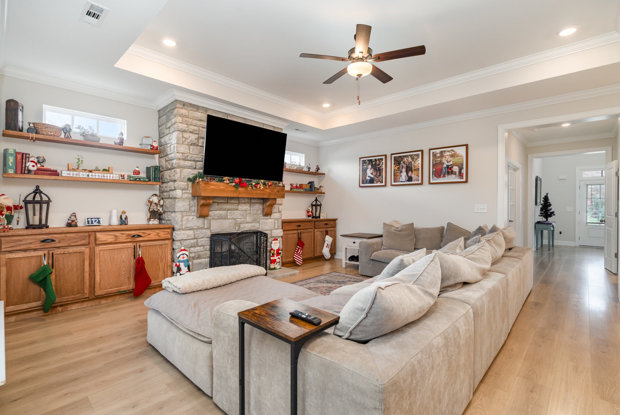 7445 Swindon Boulevard Fairview, TN 37062 - Photo 6 of 38 a living room with furniture fireplace and a flat screen tv
