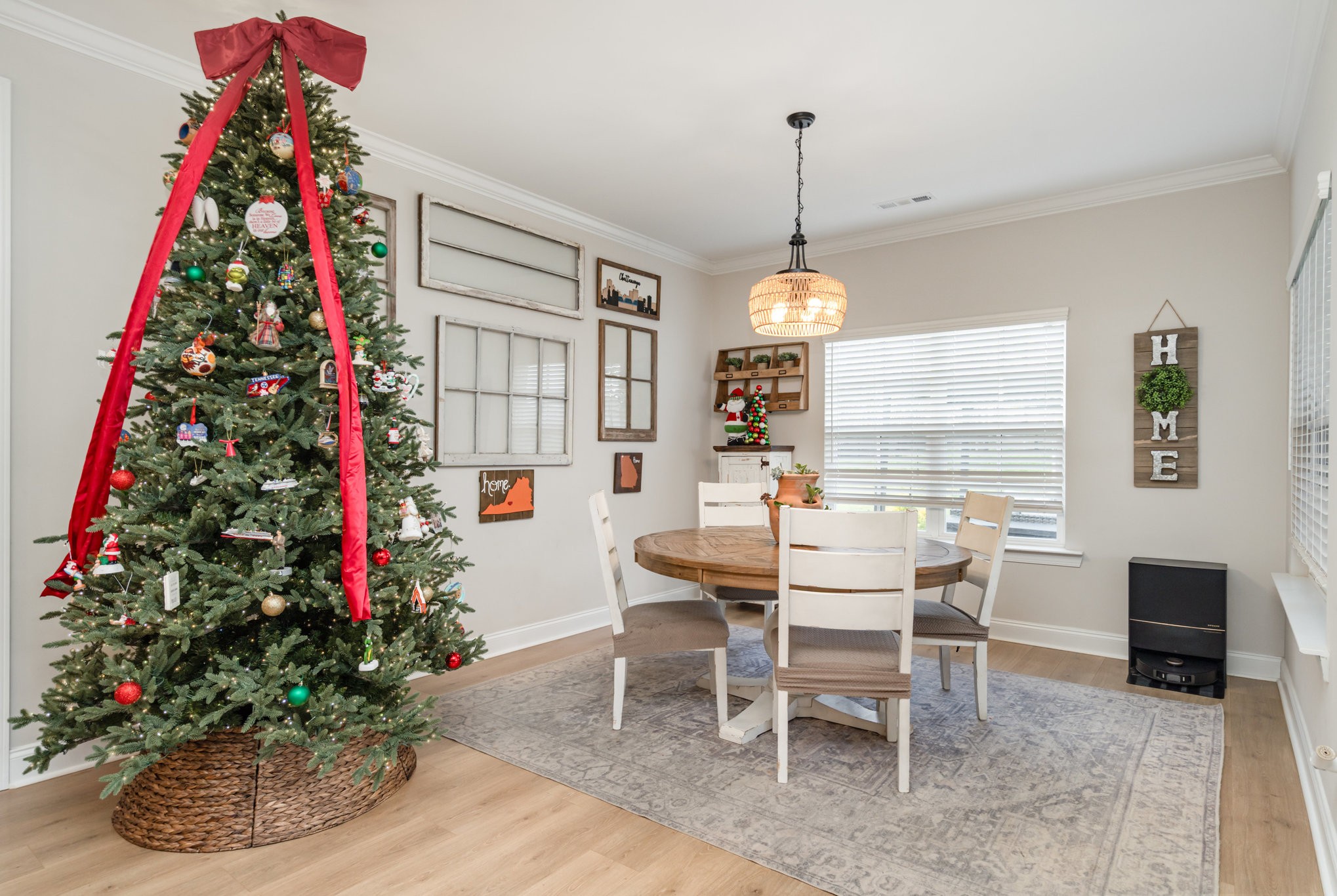 7445 Swindon Boulevard Fairview, TN 37062 - Photo 8 of 38 a view of a dining room with furniture window and wooden floor