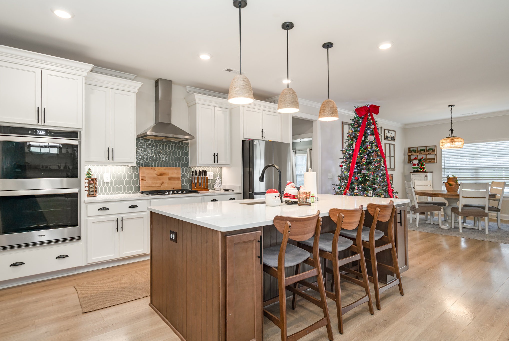 7445 Swindon Boulevard Fairview, TN 37062 - Photo 9 of 38 a view of dining table chairs and kitchen view