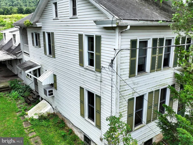 a view of a house with roof deck