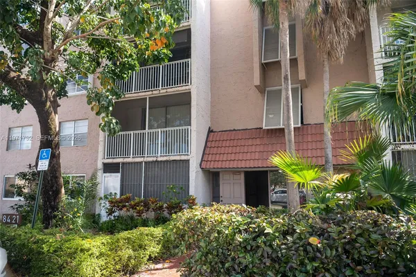 a car parked in front of a house