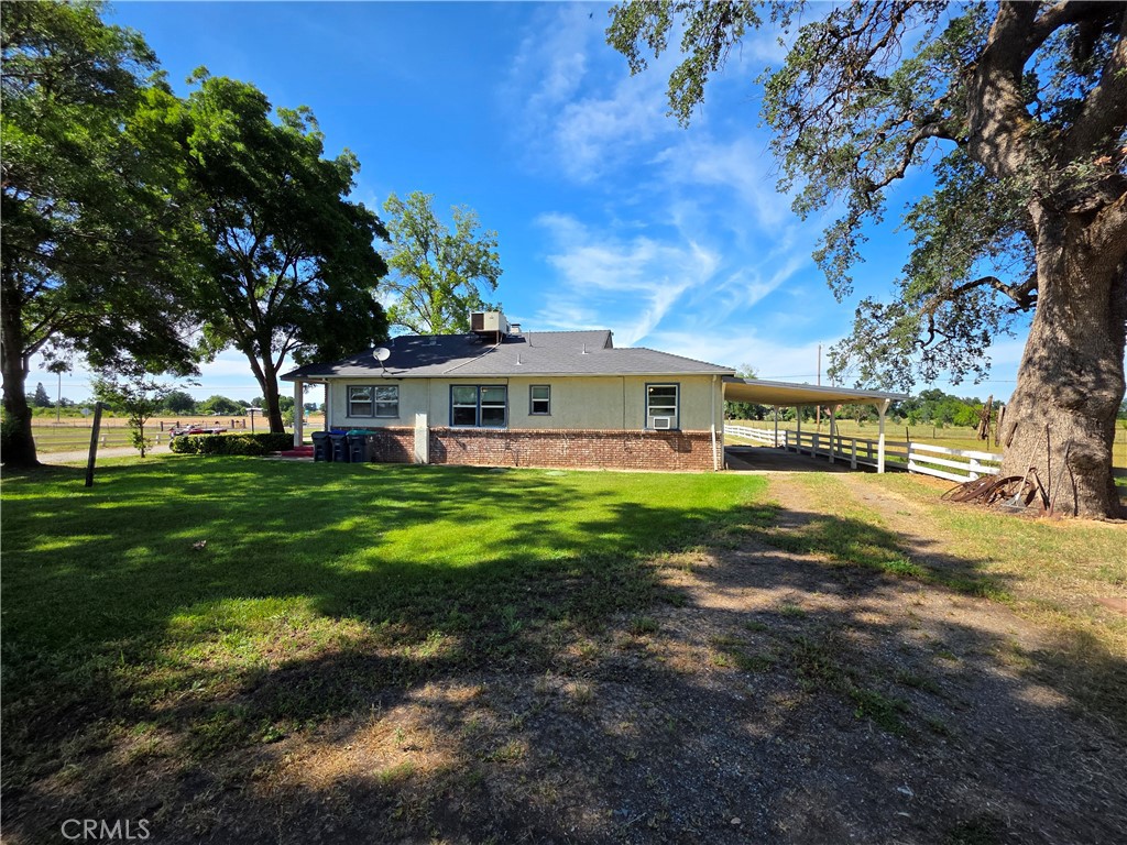 23773 River Road Corning, CA 96021 - Photo 41 of 64 a view of a house with a big yard
