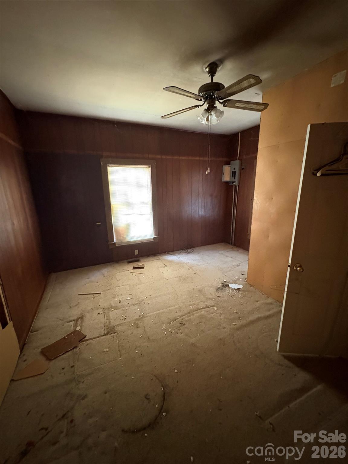113 Davie Street Cooleemee, NC 27014 - Photo 5 of 14 a view of a livingroom with a ceiling fan and window